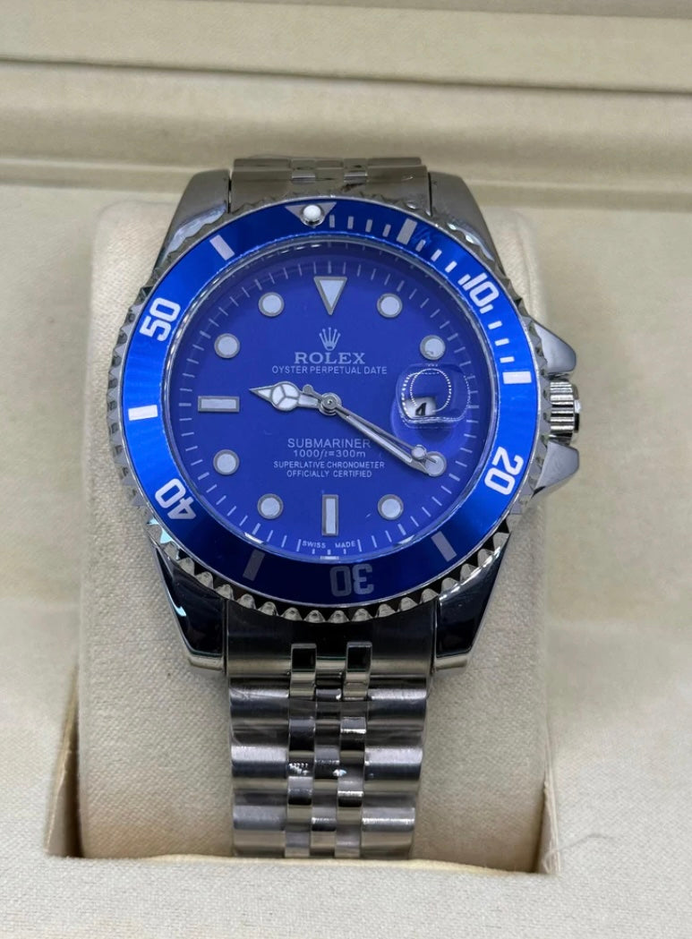 Rolex submariner silver with blue rotating dial with date