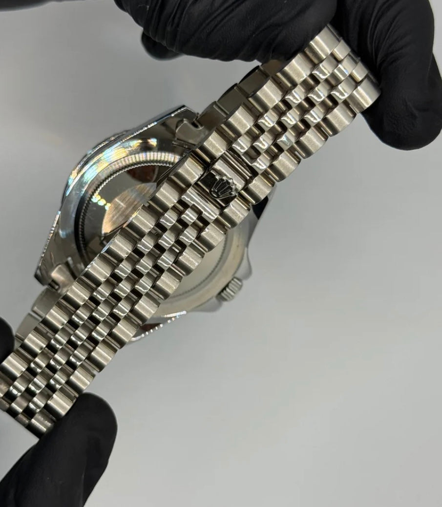 Rolex submariner silver with blue rotating dial with date