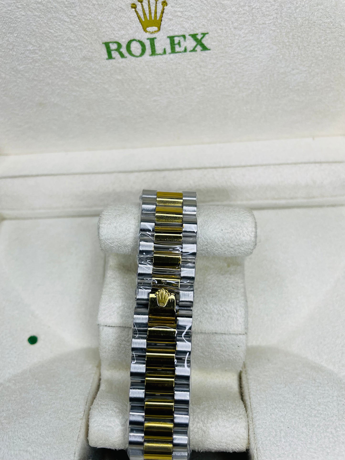 RLX black & golden dial with chain strap