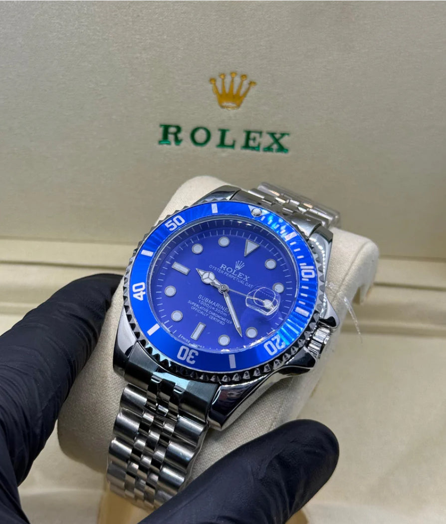 Rolex submariner silver with blue rotating dial with date