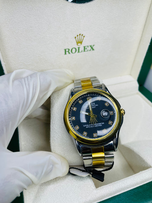 Black and golden dial with date