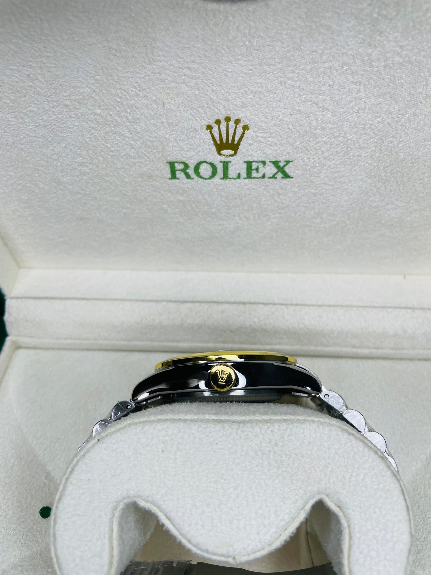 RLX black & golden dial with chain strap