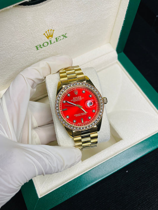 Red dial with golden chain