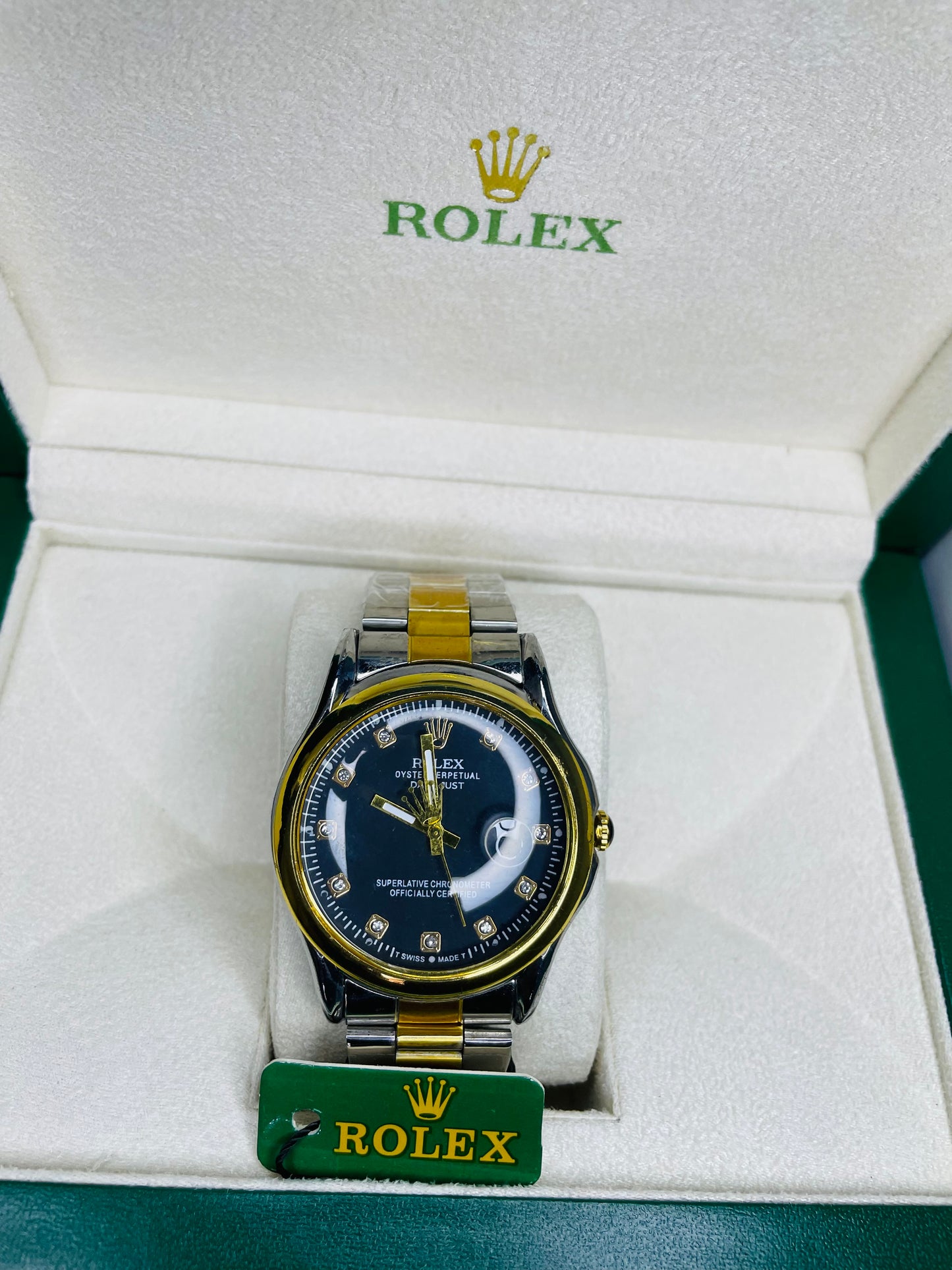 Black and golden dial with date