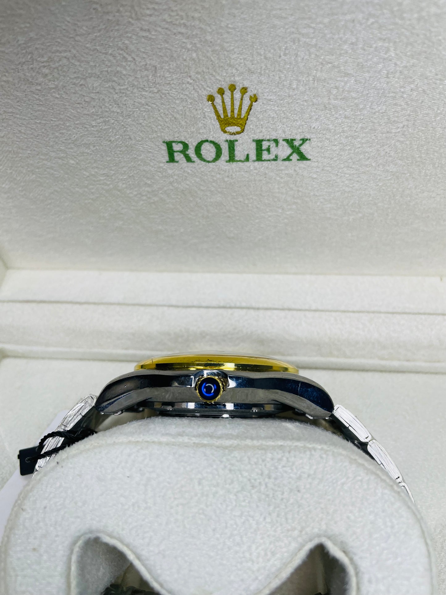 Black and golden dial with date