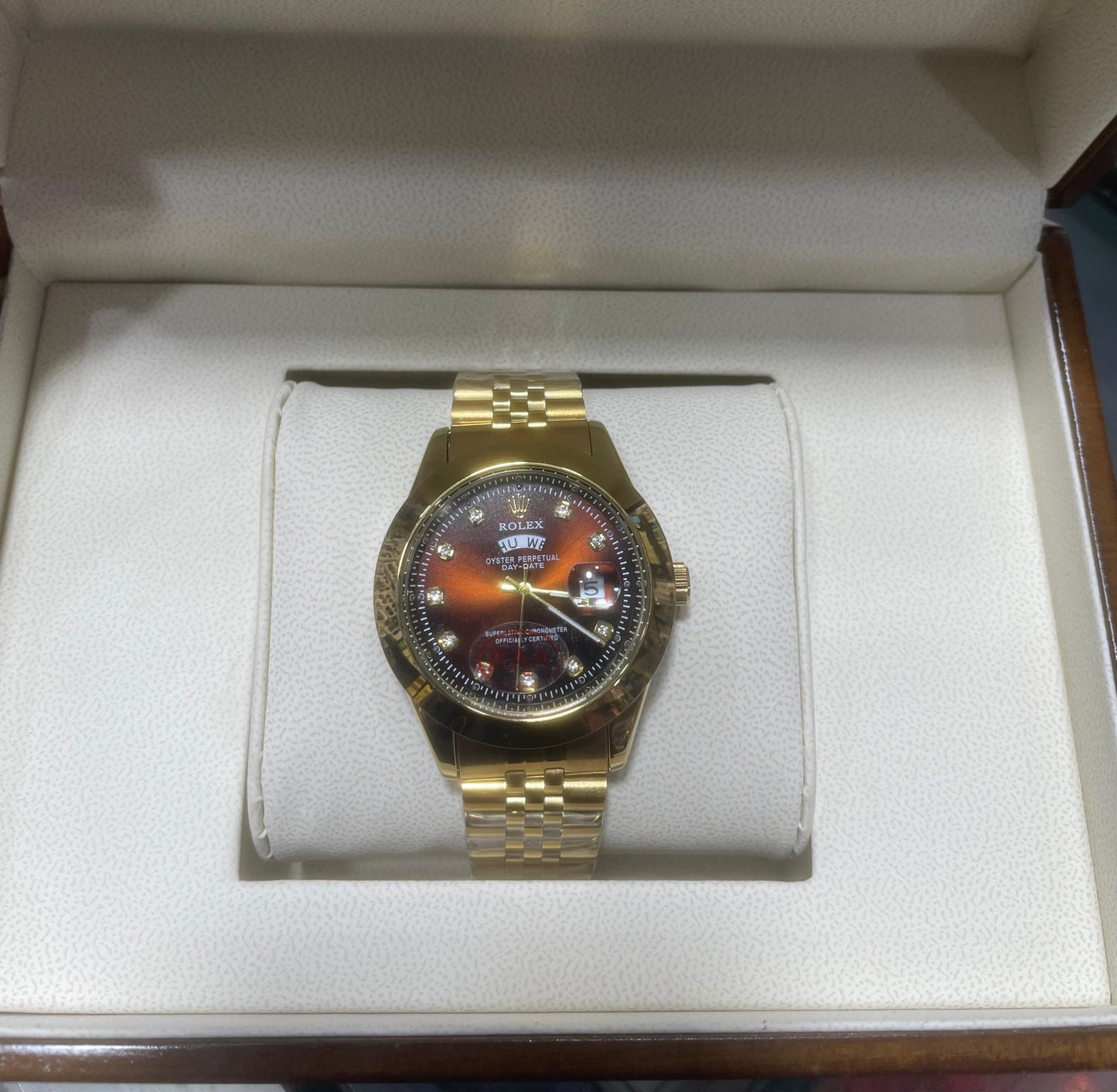Rolex Day&Date with Red Dial golden jubilee chain